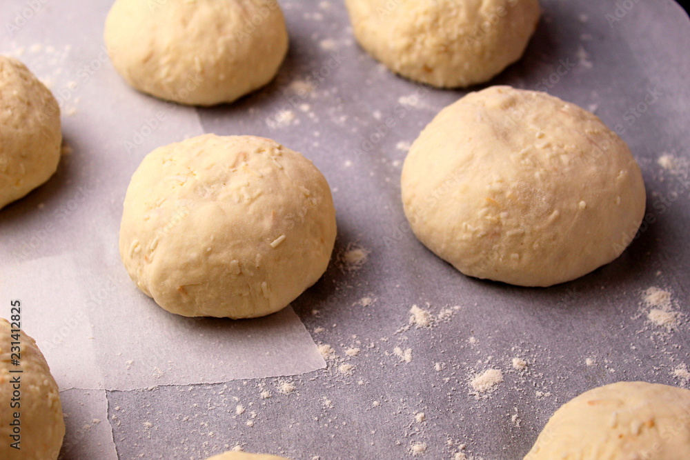 homemade buns close-up with their own hands.