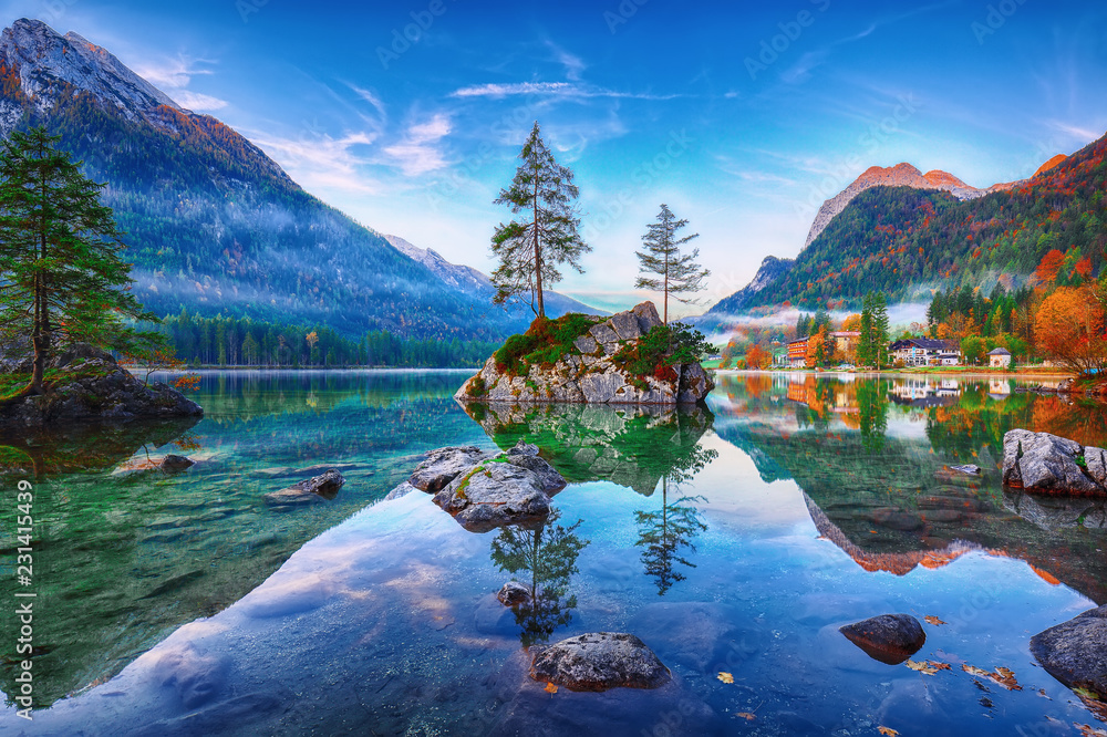 Fantastic autumn sunrise of Hintersee lake. Classic postcard view of Hintersee - obrazy, fototapety, plakaty 