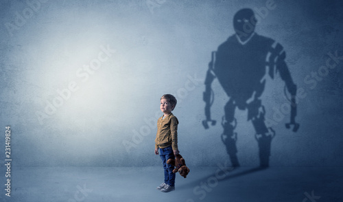 Little boy s self image appear as a big robotman shadow on his background   © ra2 studio