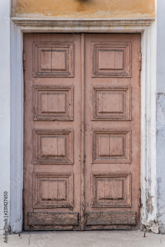 Old abandoned door without handles