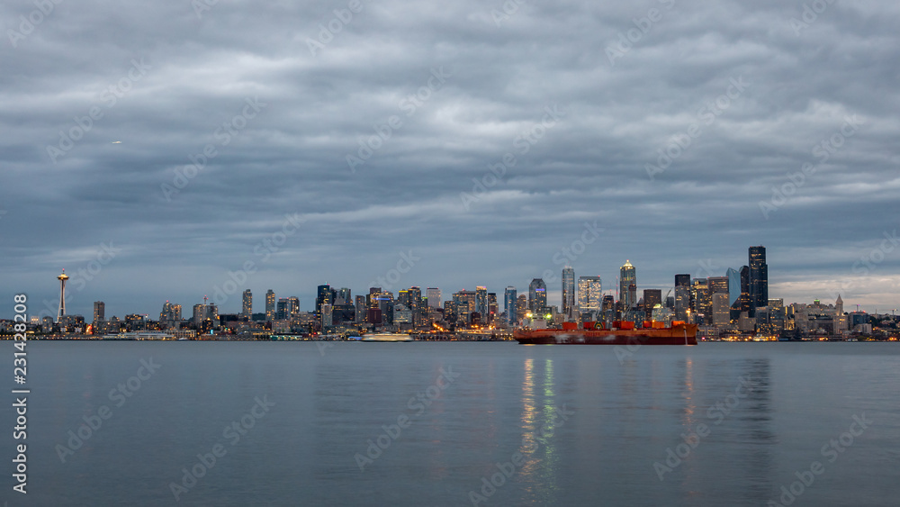 View of the Lit Downtown Seattle Skyline at Sunset