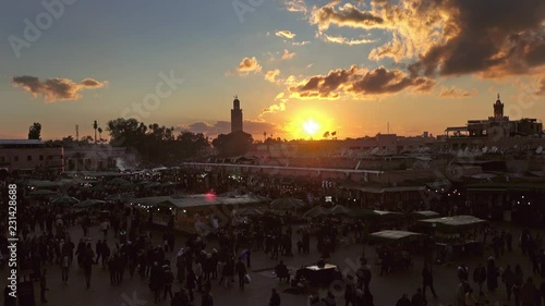 Famous Jemaa el Fna square crowded at sunset, Marrakesh, Morocco, 4k photo