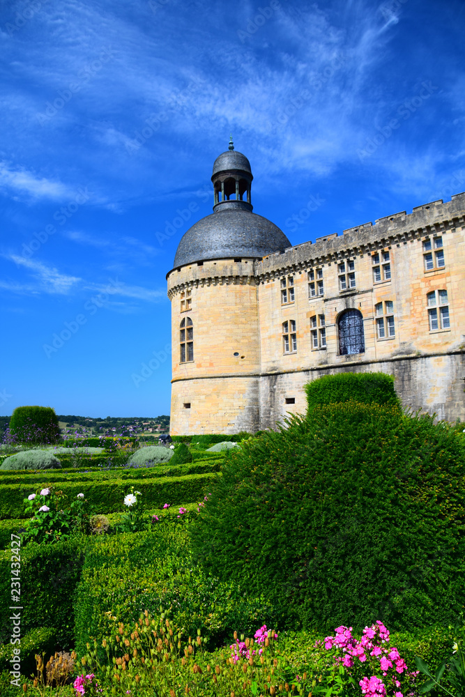 The gardens and outer walls of the magnificent Chateau de Hautefort in Aquitaine, France