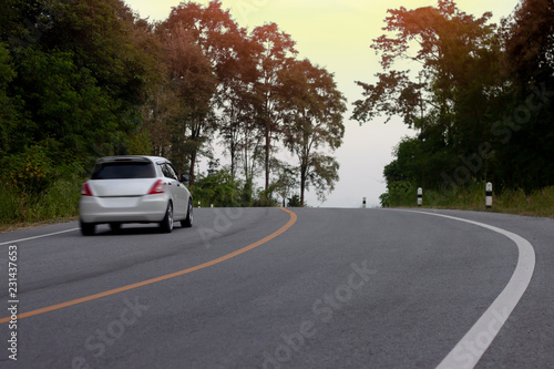 Blurred car trip travel asphalt road on mountain at Hills Banchang Rayong Thailand. 