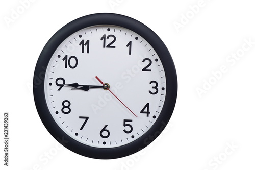 Time concept with black clock at a quarter to nine