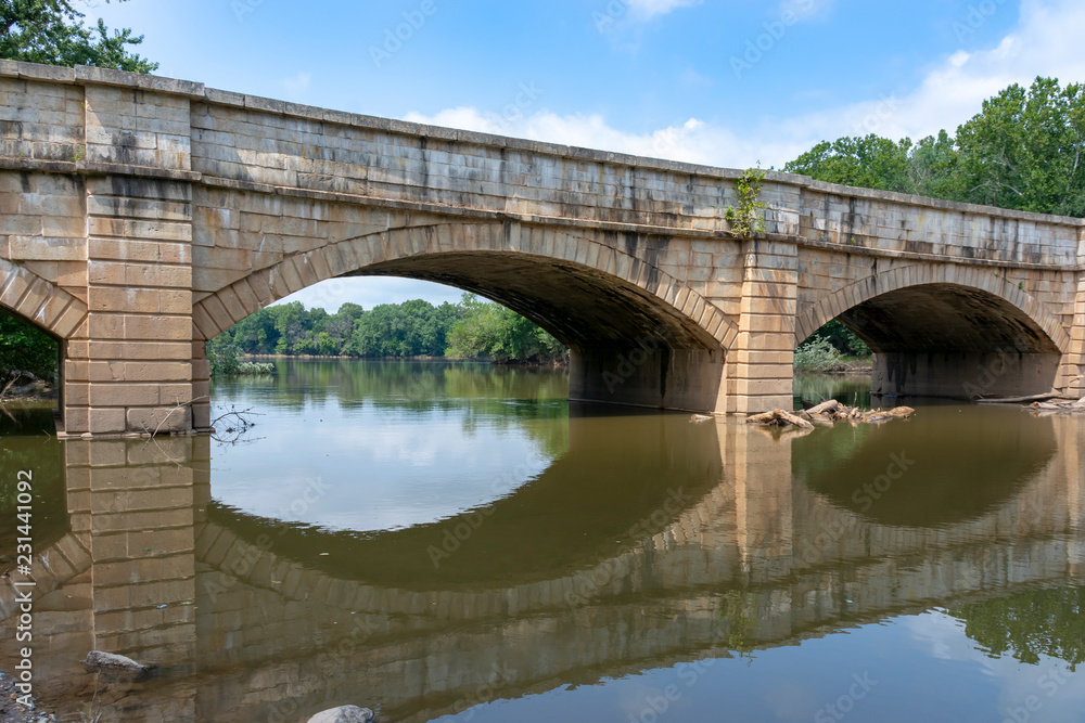 The Monocacy Aqueduct is the largest aqueduct on the Chesapeake and Ohio Canal, crossing the Monocacy River just before it empties into the Potomac River in Frederick County, Maryland, USA. The Monocacy Aqueduct is the largest aqueduct on the Chesapeake and Ohio Canal, crossing the Monocacy River just before it empties into the Potomac River in Frederick County, Maryland, USA.