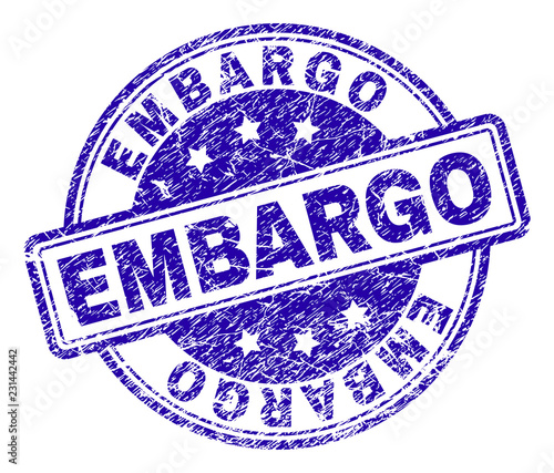 EMBARGO stamp seal imprint with grunge texture. Designed with rounded rectangles and circles. Blue vector rubber print of EMBARGO label with dust texture.