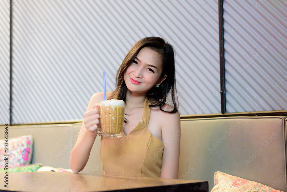 Asian pretty girl has relaxing with coffee at coffee cafe restaurant. Asian pretty girl has relaxing with coffee at coffee cafe restaurant.