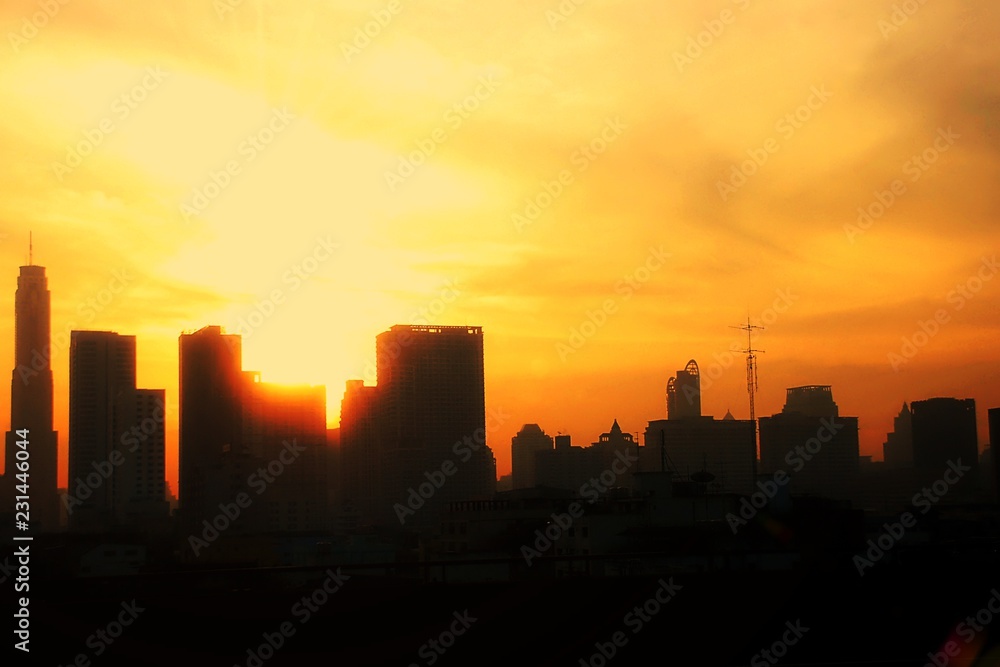 City silhouette against the sky on a sunrise, Bangkok city, Thailand.