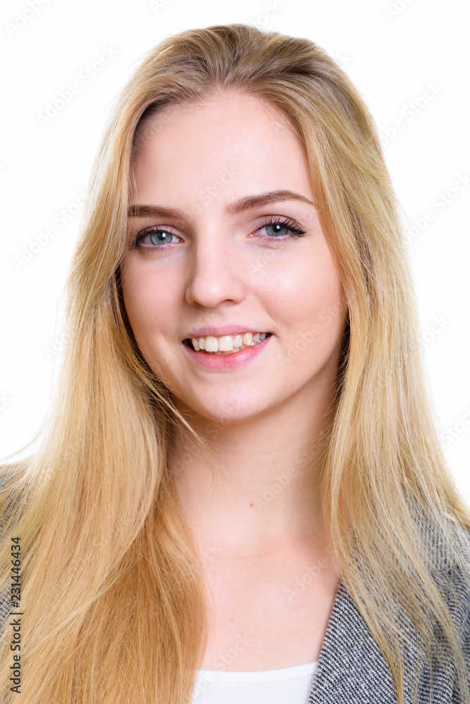 Face of young happy blonde businesswoman smiling Face of young happy blonde businesswoman smiling