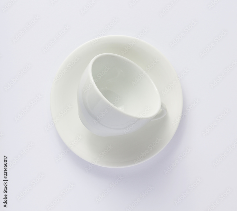 empty cup and saucer isolated on white empty cup and saucer isolated on white