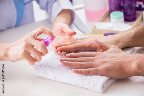 Hands during manicure care session