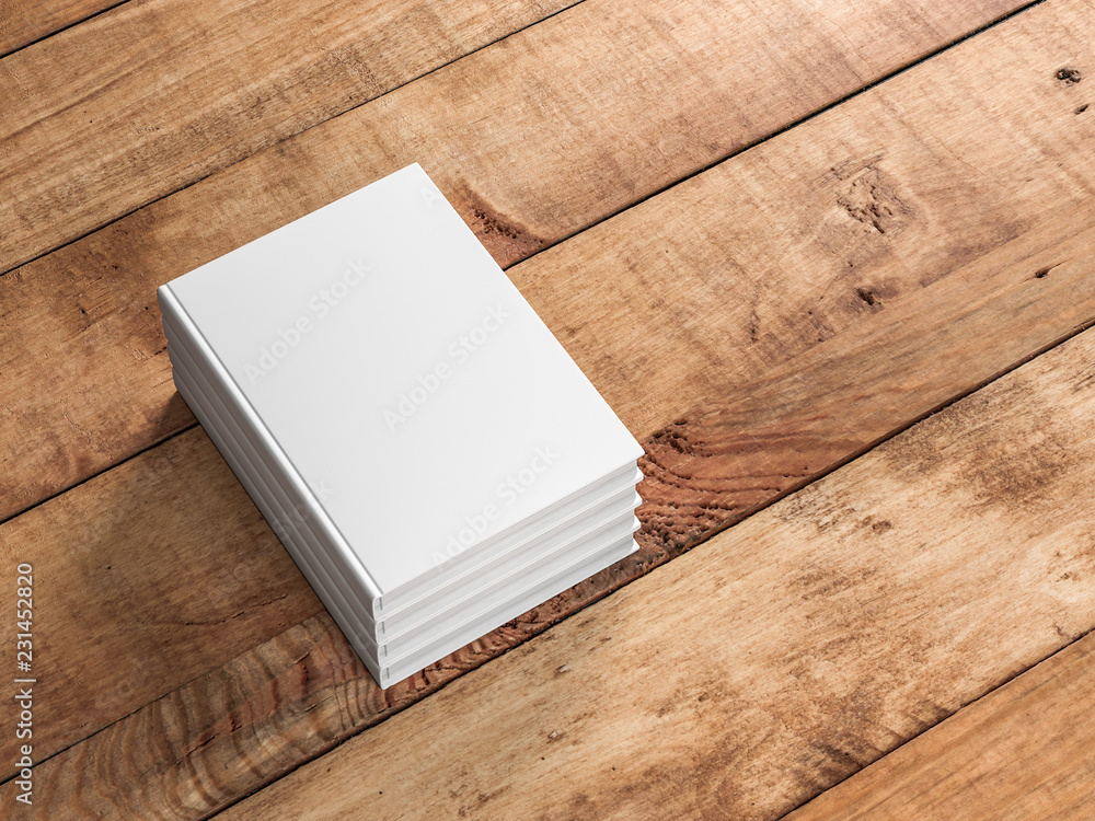 Fototapeta premium Stack White empty books mockup on wooden table