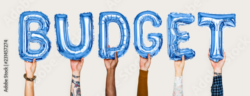Konstfotografi Hands holding budget word in balloon letters