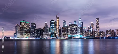 Obraz Manhattan panoramic skyline at night. New York City, USA. Office buildings and skyscrapers at Lower Manhattan (Downtown Manhattan)..