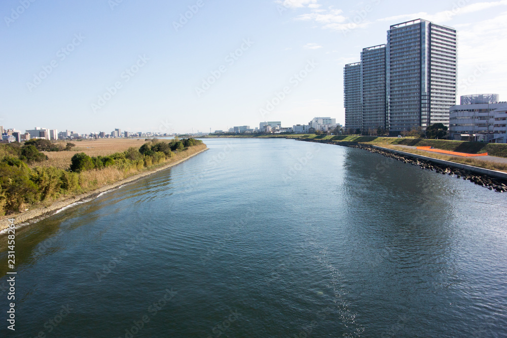 View of Tama River from Shin-Rokugo Bridge between Tokyo and Kanagawa Prefecture.