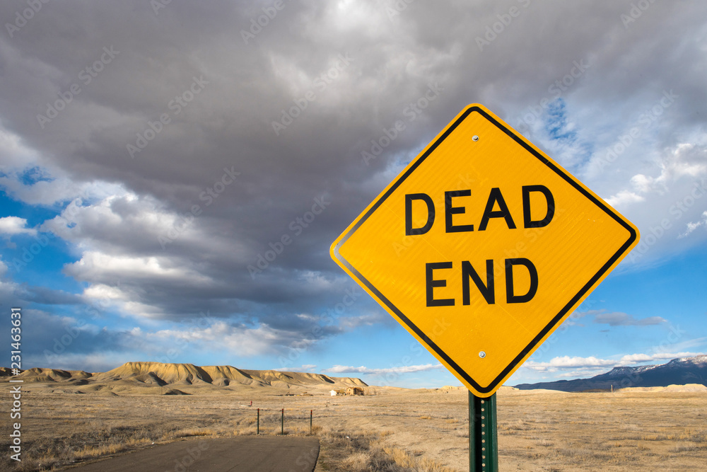 dead end sign on a dead end road in the desert Stock Photo