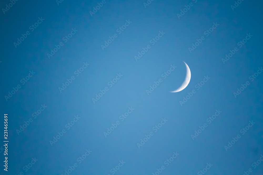 Moon's Crescent Phase Against a Black Night Sky Moon's Crescent Phase Against a Black Night Sky