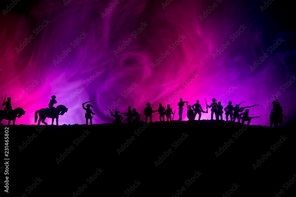 American Civil War Concept. Military silhouettes fighting scene on war fog sky background. Attack scene. American Civil War Concept. Military silhouettes fighting scene on war fog sky background. Attack scene.
