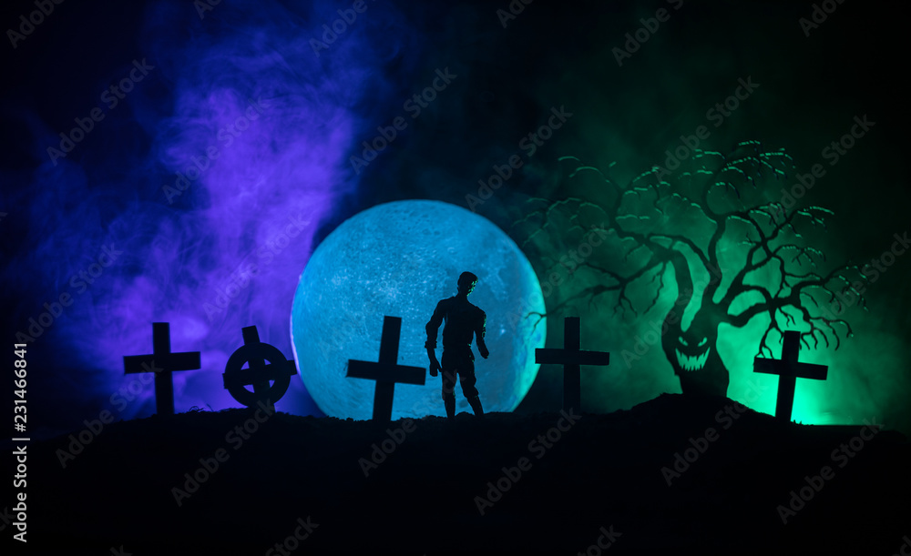 Scary view of zombies at cemetery dead tree, moon, church and spooky cloudy sky with fog, Horror Halloween concept. Scary view of zombies at cemetery dead tree, moon, church and spooky cloudy sky with fog, Horror Halloween concept.