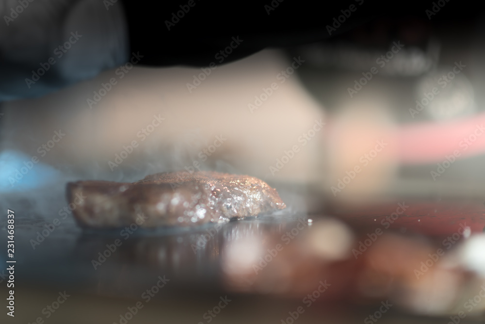 Large piece of fresh beef meat prepared on a grill pan. Large piece of fresh beef meat prepared on a grill pan.