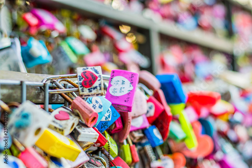 areity of locked key at N Seoul tower on the Namsan mountain that people believe they will have the forever love if write the couple name on it