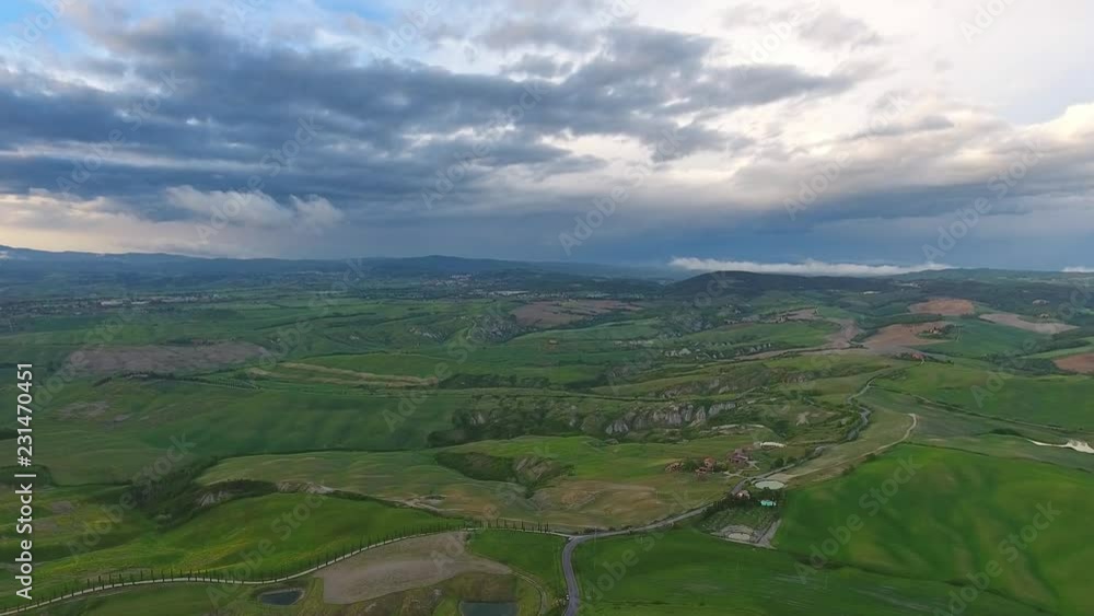 Tuscany aerial landscape of farmland hill country at evening. Italy, Europe, 4k Tuscany aerial landscape of farmland hill country at evening. Italy, Europe, 4k