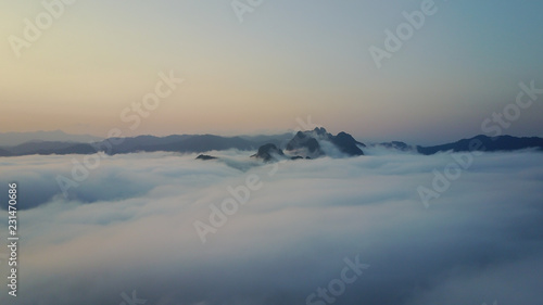 Aerial Khao Sok National Park with jungle and Clouds