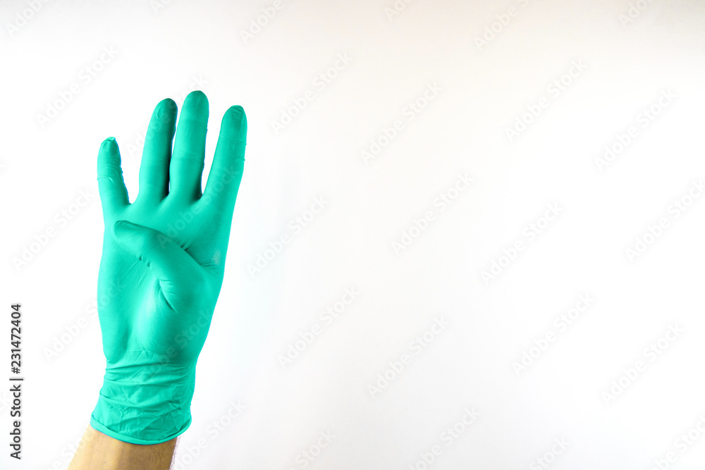 Male hand in medical glove on white background. Male hand in medical glove on white background.