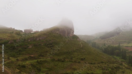 Beautiful Time-lapse of Clavijo Castle on hillttop covered in fog – wide shot photo