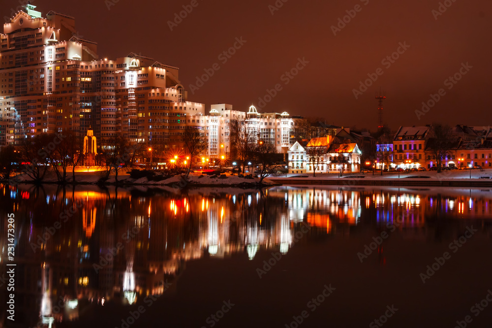 Minsk, Belarus-December 2017: night city, Nemiga and the river Svisloch decorated for the festive New Year illumination