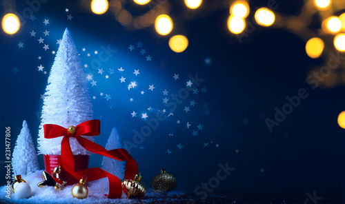 Christmas tree and holidays light decoration on blue background