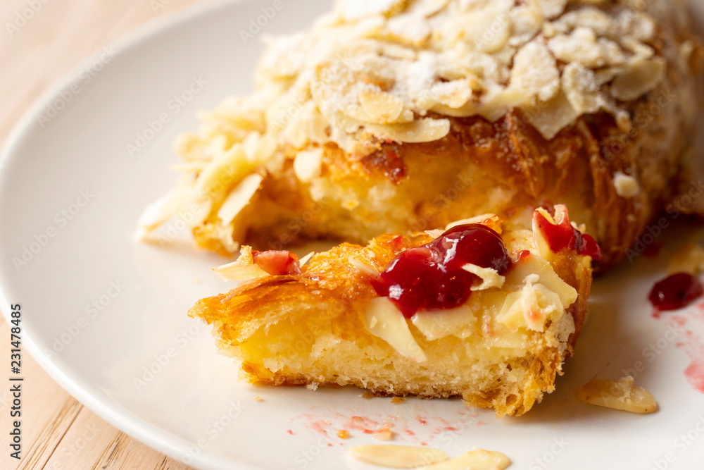 croissant bread with strawberry jam and nut on white dish for food croissant bread with strawberry jam and nut on white dish for food