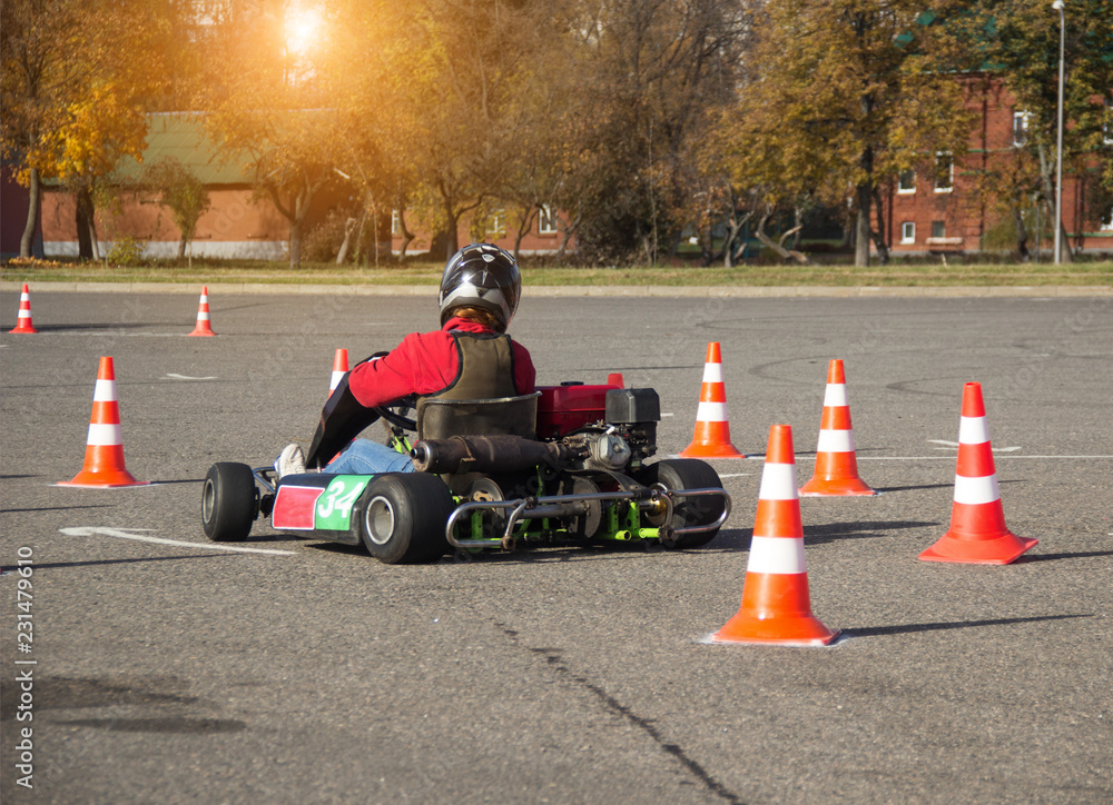 Karting competitions, a karting participant performs time maneuvers, motor racing