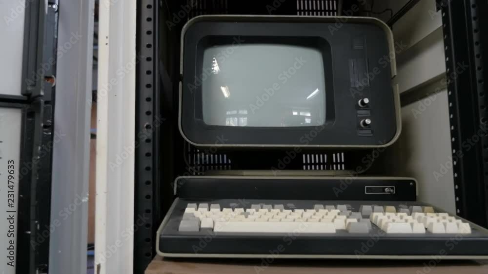 Slider view of old computer with CRT monitor. Concept: retro style, vintage, science, nostalgia