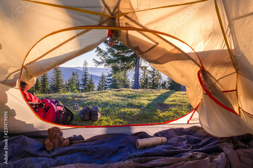 View of the mountains from the tent. View from a tourist tent.