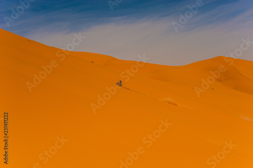 Rider on a dune in Erg Chebbi, Merzouga, Morocco