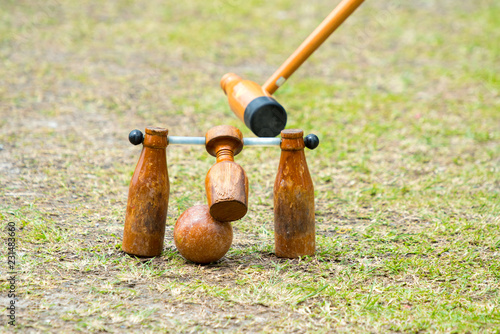 woodball player on field with woodball gate and stick on competition photo