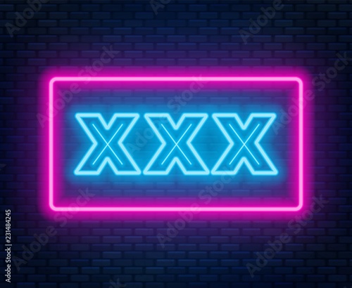 XXX neon sign on a dark background.