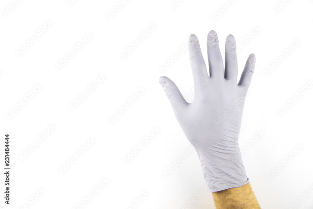 Male hand in medical glove on white background. Male hand in medical glove on white background.