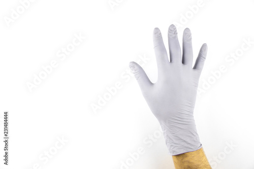 Male hand in medical glove on white background.