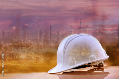 White helmet and industrial background, Safety concept, Refinery background.
