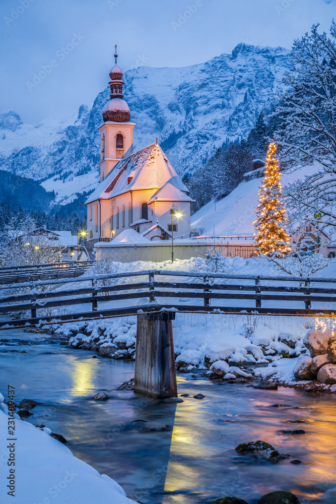 Church of Ramsau in winter twilight, Bavaria, Germany