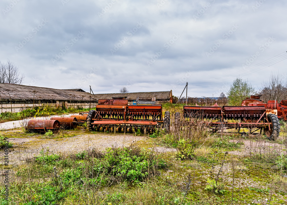 Old agricultural machinery. .Abandoned collective farm. Russia, Tula region. Old agricultural machinery. .Abandoned collective farm. Russia, Tula region.