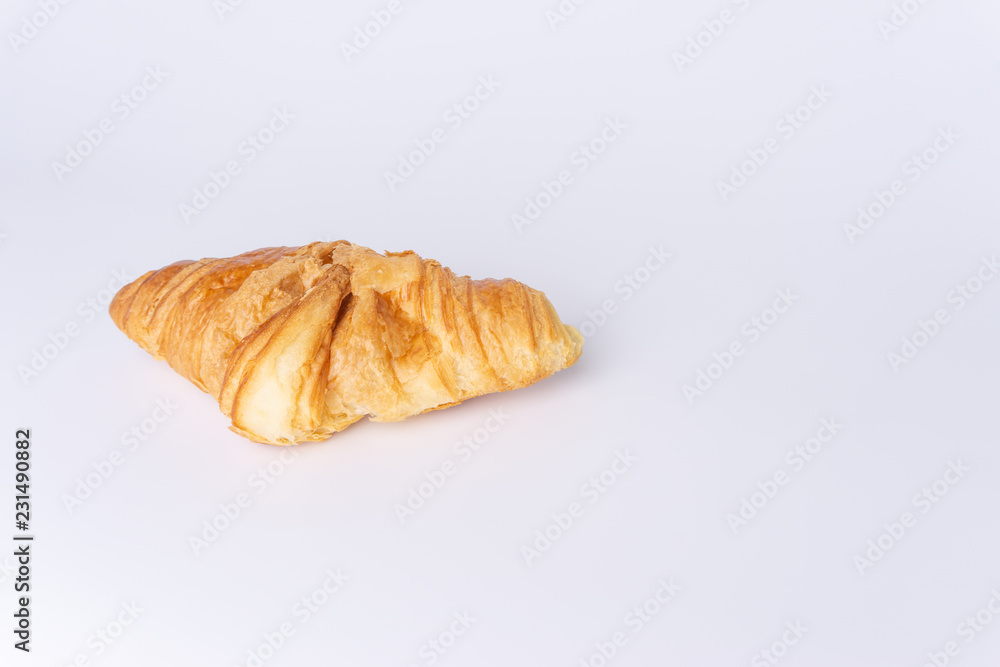 Plain croissant on white background Plain croissant on white background