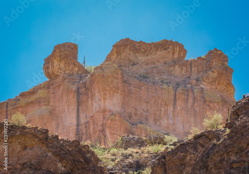 Arizona desert wilderness sheer rocky cliffs surround a man made lake in Arizona's wilderness area