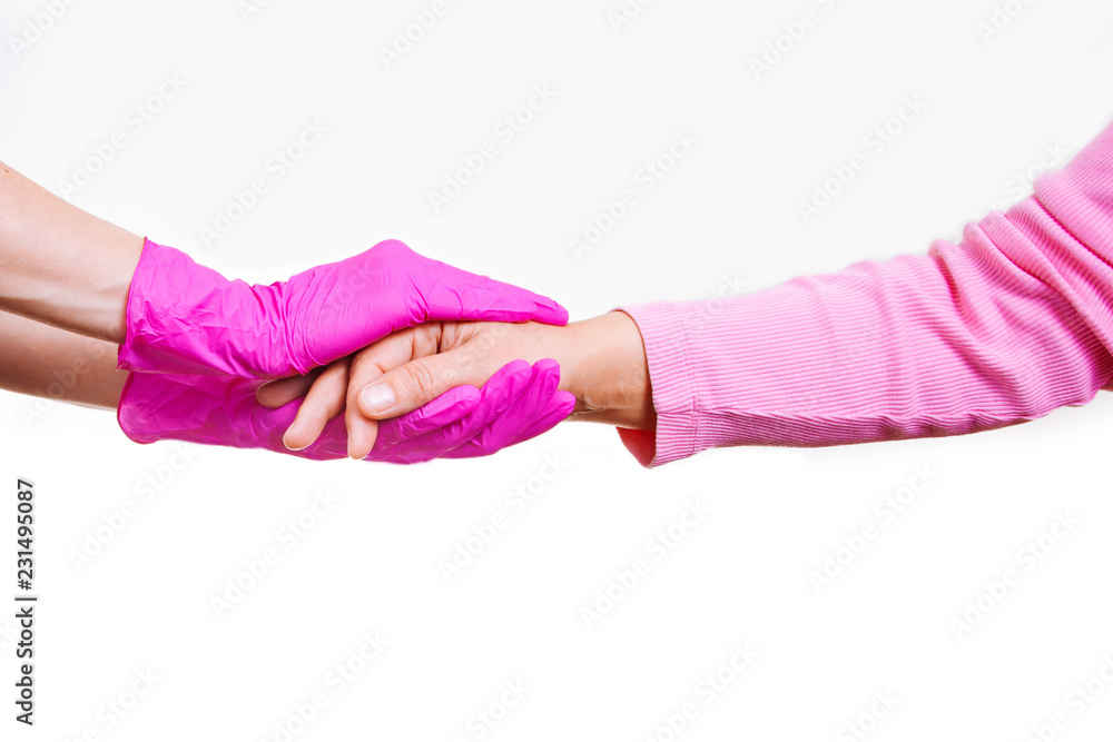 Fototapeta premium woman keep carry closeup retiree gloves doctor hospice pink nurse hands old person white background medical