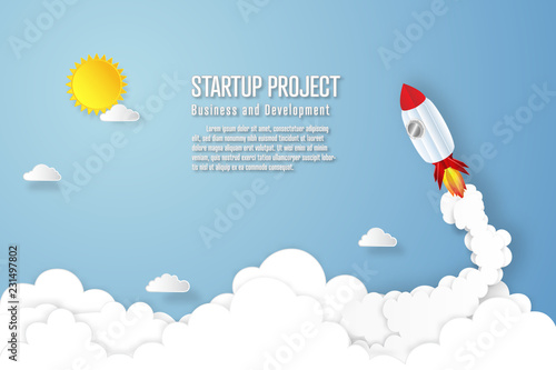 Rocket launch on the clouds and blue sky as paper art, craft style and business Startup project concept. flat design vector illustration.