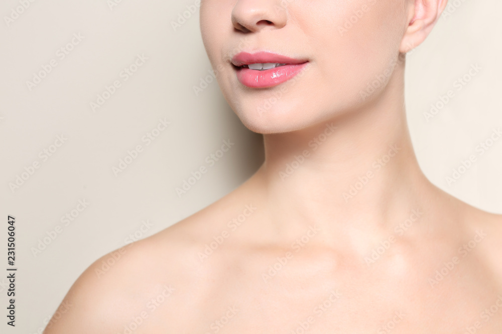 Beautiful young woman with perfect lips makeup on light background, closeup Beautiful young woman with perfect lips makeup on light background, closeup