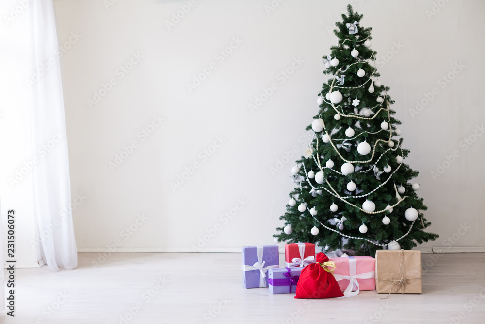 Christmas tree with presents in winter for the new year